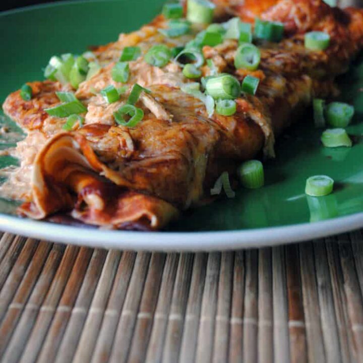 Easy dinner recipes don't get tastier than Creamy Chicken Enchiladas - Get the recipe for this easy Mexican dinner on PassTheSushi.com