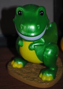 The toy dinosaur that kept me company while I baked double chocolate chip cupcakes