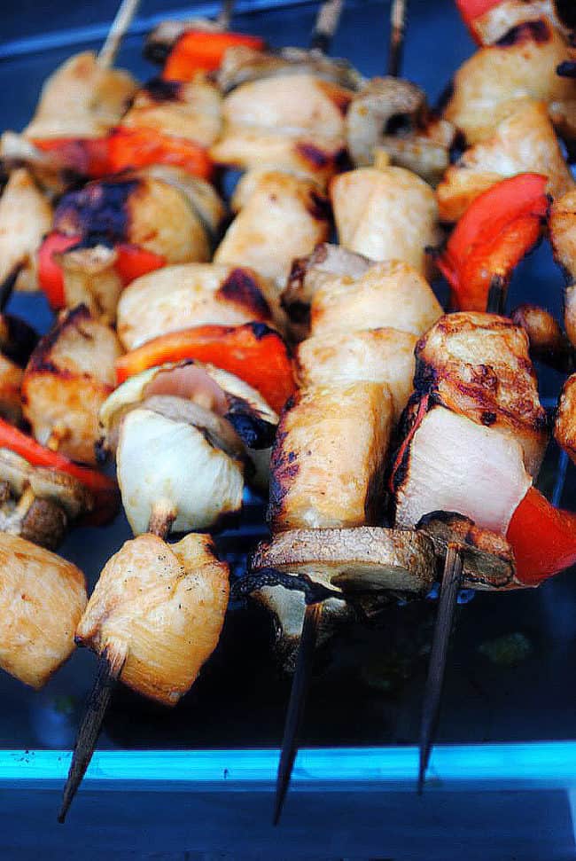 Grilled chicken kabobs are a recipe that uses fresh chicken breast and garden vegetables. Season them up, put them onto skewers and grill them up for an easy weeknight dinner. | Get the recipe from passthesushi.com