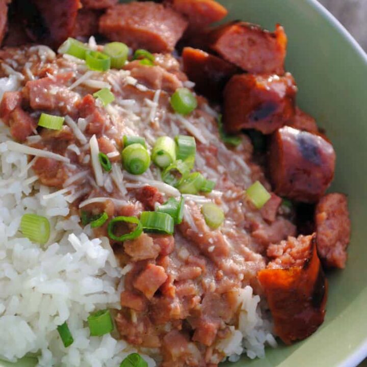 New Orleans style red beans and rice has all of the flavors you expect in Cajun food, plus bacon! Really, you can add just about anything you want with bacon and it will be awesome. | Recipe from passthesushi.com
