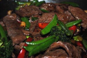 Teriyaki beef stir fry is a delicious dinner that cooks up so quickly, it won't heat up your kitchen while you're cooking it. Get the recipe from Pass the Sushi