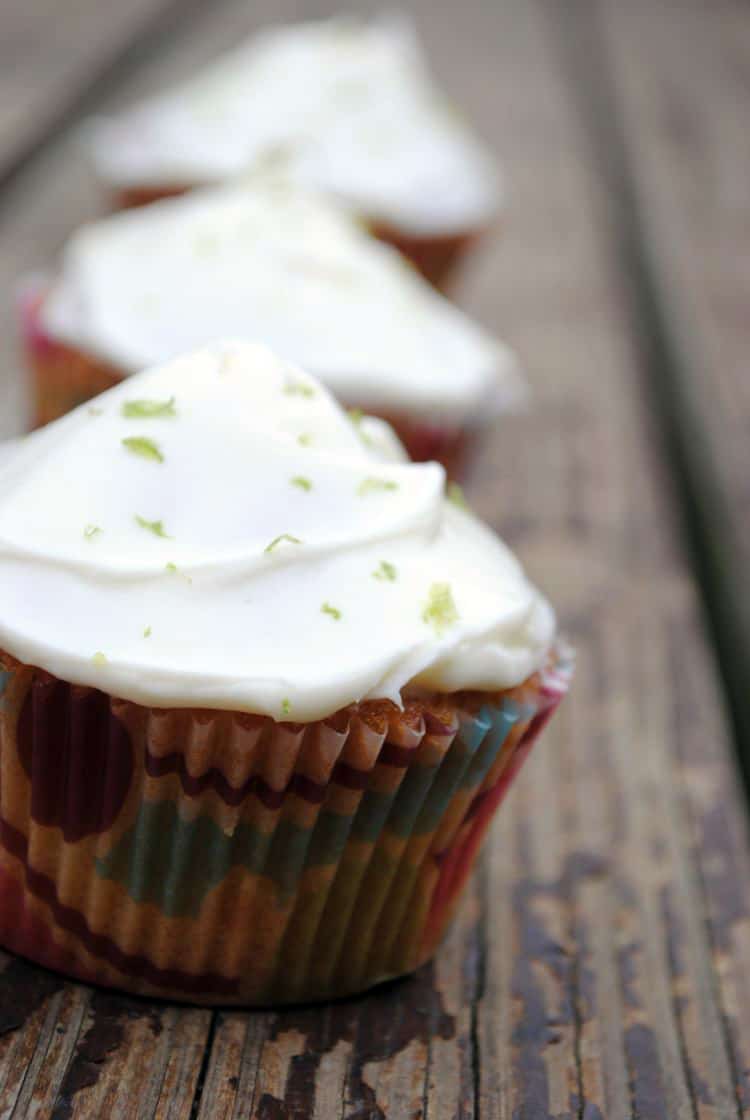 Key Lime Coconut Cupcakes are a taste of summer sunshine. With bright lime and coconut flavors in the moist cupcake and a lime cream cheese frosting on top, you'll want to devour these treats!