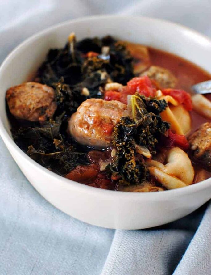 Sausage Soup with Mixed Greens and Cornmeal Dumplings \\ Recipe on PassTheSushi.com
