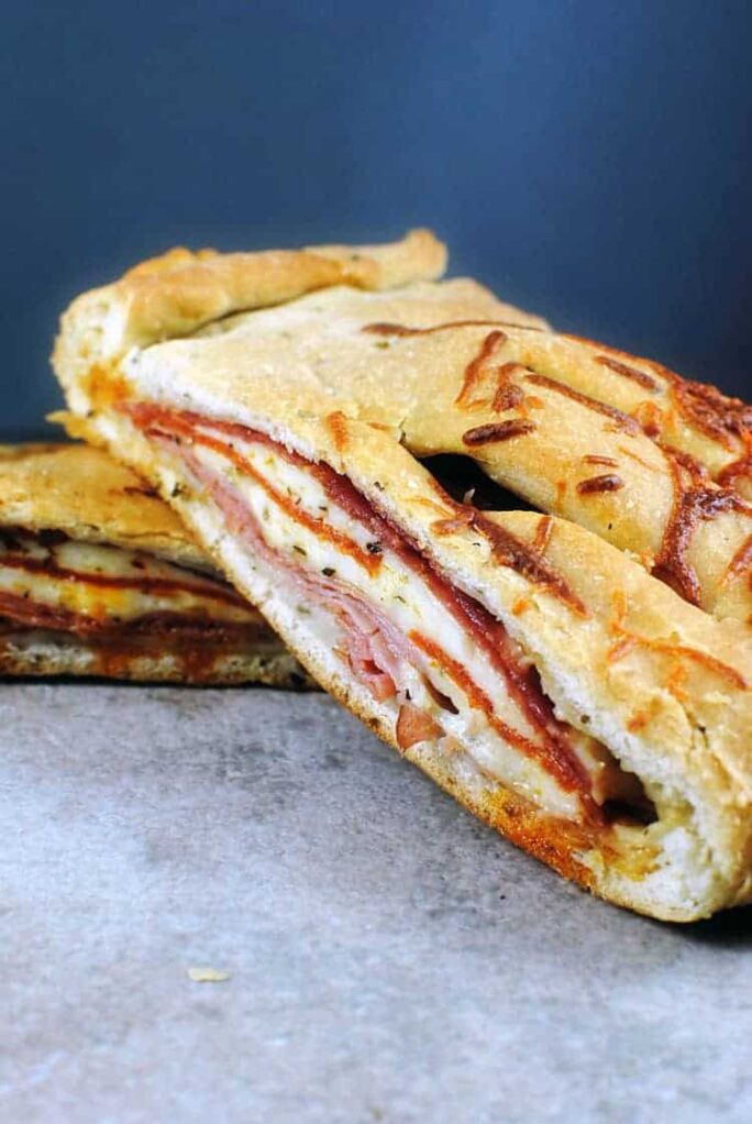 Cheesy 2-meat Stromboli - A quick and easy comfort food meal. Recipe on PassTheSushi.com