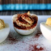 3 varieties of deviled eggs. Classic deviled eggs, Southern deviled eggs, and bacon cheddar deviled eggs.