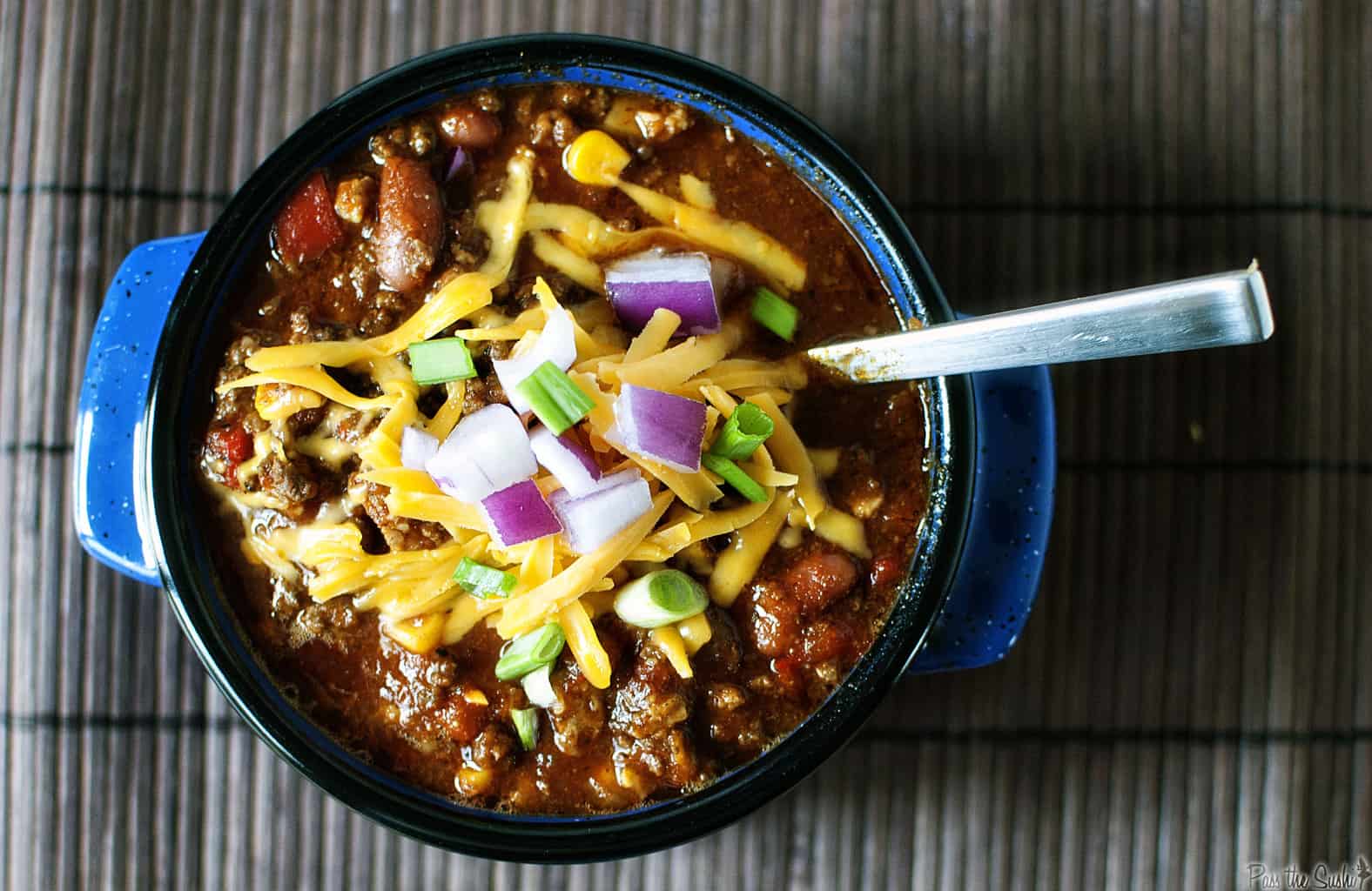 ﻿Feed a crowd ﻿with this big-batch slow cooker chili. Easy to make, this hearty chili will stick to your ribs and make game day food a heck of a lot better! \\ PassTheSushi.com