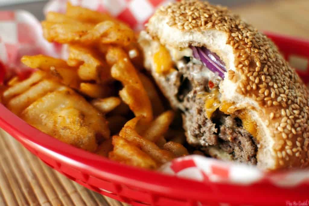 Pan seared burger with bites taken out of it | Kita Roberts PassTheSushi.com
