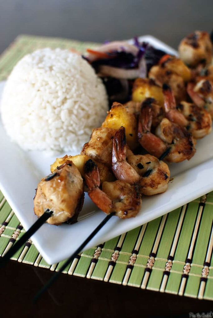 Tropical kabobs are skewers of chicken, shrimp, and pineapple that have been marinated in a tropical flavored marinade. \\ Recipe on PassTheSushi.com