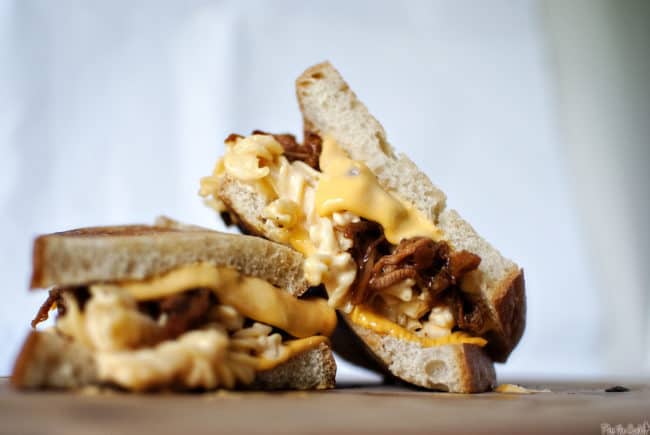 The Man-wich is a grilled mac and cheese with pulled pork. A carb lover's sandwich from Pass the Sushi.