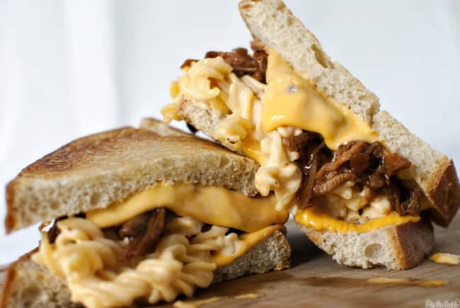The Man-wich is a grilled mac and cheese with pulled pork. A carb lover's sandwich from Pass the Sushi.