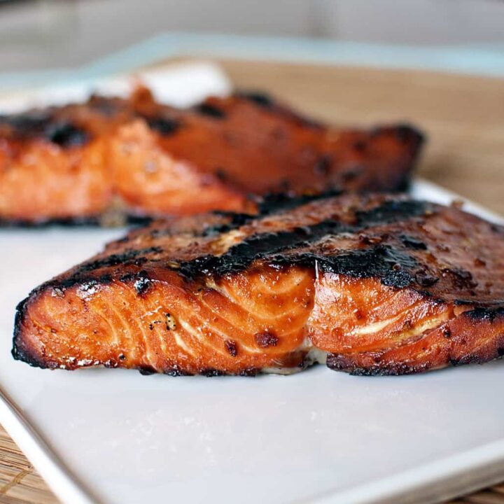 Teriyaki flame grilled salmon is fresh, wild caught salmon, marinated and flame grilled for a healthy, delicious grilled fish dinner. Get the recipe on PassTheSushi.com