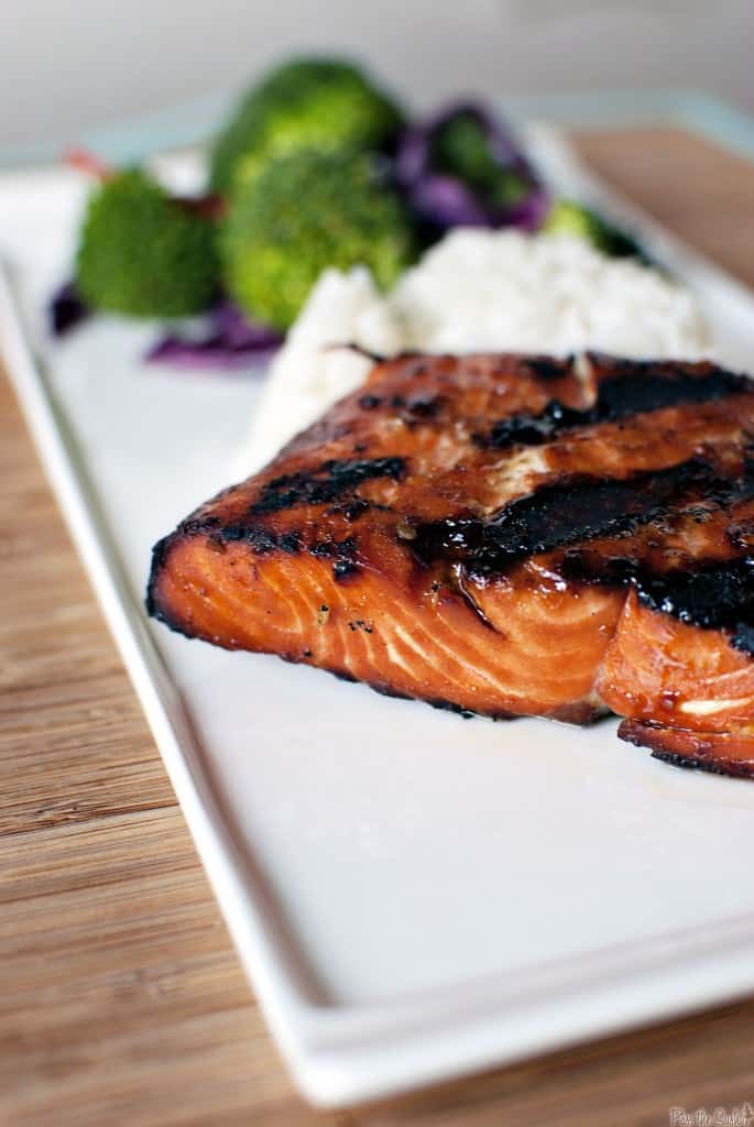 Teriyaki flame grilled salmon is fresh, wild caught salmon, marinated and flame grilled for a healthy, delicious grilled fish dinner. Get the recipe on PassTheSushi.com