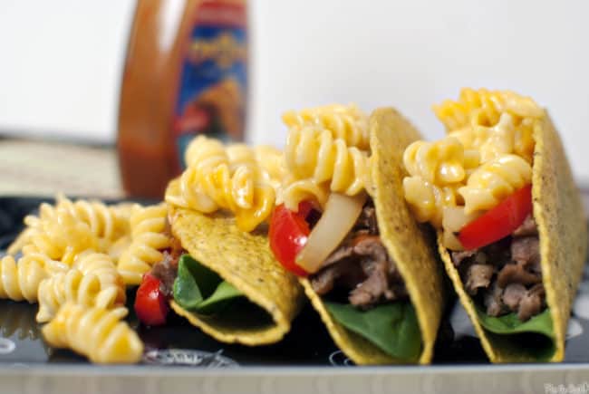 Using leftovers from your fridge before they go bad is easy and delicious with this recipe for mac and cheese steak tacos. Get the comfort food recipe from passthesushi.com