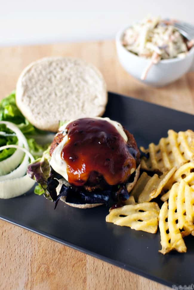 Barbecue chicken burgers are a quick, easy weeknight dinner, and sure to be a family favorite recipe. Made with healthy ground chicken. // Recipe on PassTheSushi.com