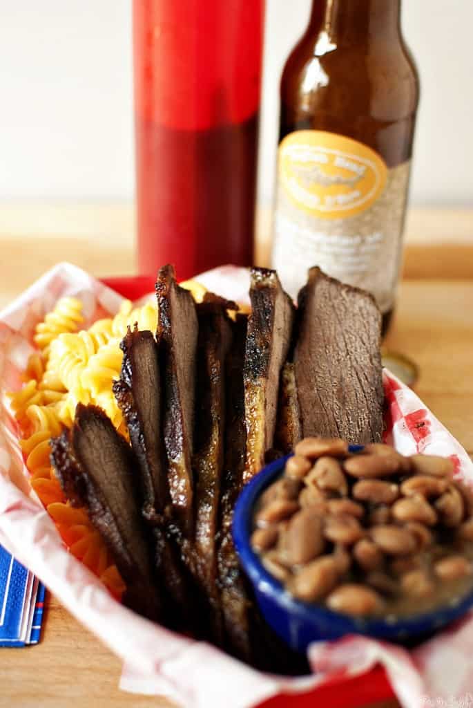 Learn how to make smoked brisket - a cut of beef that is so flavorful and tender, it will melt in your mouth! Recipe on PassTheSushi.com