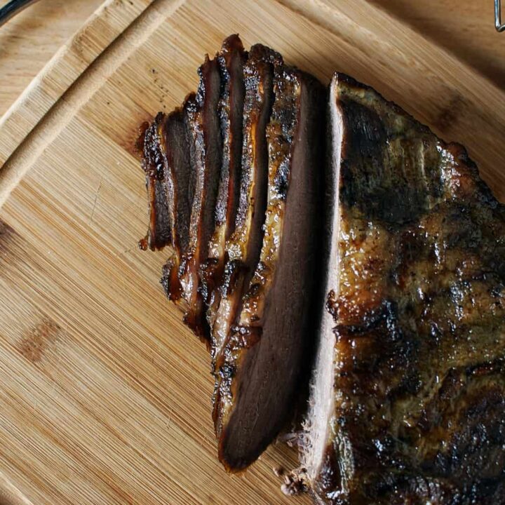 Learn how to make smoked brisket - a cut of beef that is so flavorful and tender, it will melt in your mouth! Recipe on PassTheSushi.com