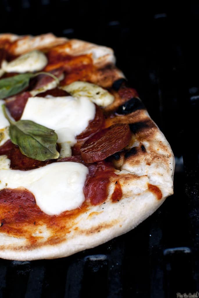 This grilled everything pizza recipe pairs your love for grilling and your love for pizza. Grilled meats, marinara sauce, fresh herbs and hot melted cheese.