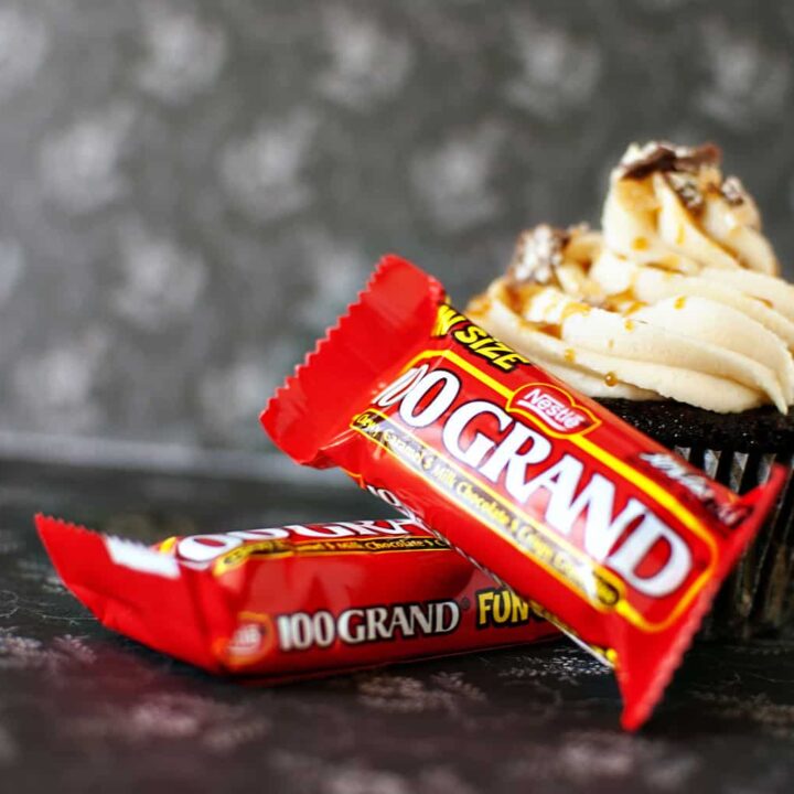 100 Grand cupcakes are dessert heaven. 100 Grand candy bars, stuffed inside and on top of moist chocolate cupcakes. With a caramel drizzle and fluffy buttercream frosting. \\ PassTheSushi.com