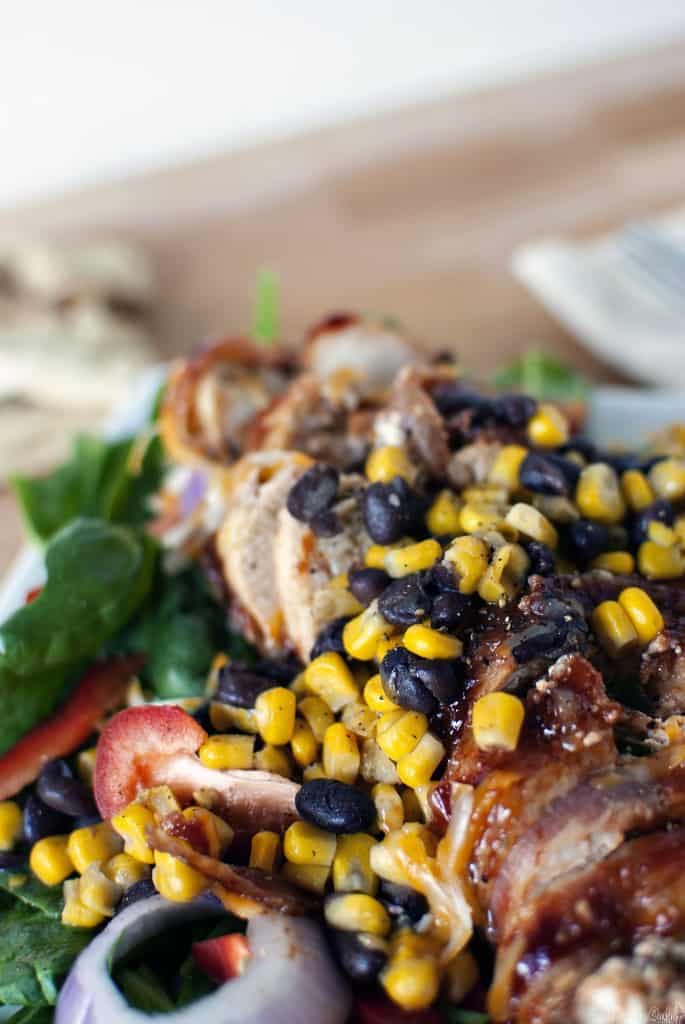 Barbecue stuffed chicken salad takes the best of barbecued chicken and pairs it with a Southwest style salad. Black beans, corn, and jalapenos, along with creamy goat cheese! // PassTheSushi.com