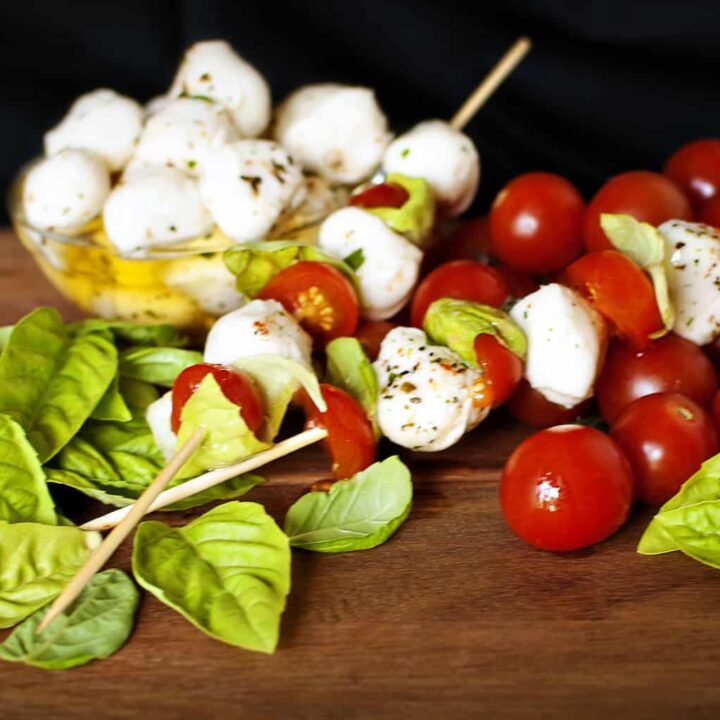 Caprese appetizer skewers are easy to make and delicious to eat. They'll become one of your easy appetizer favorites! // PassTheSushi.com