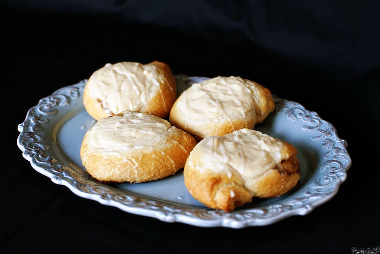 Refrigerated crescent roll dough is the base of this easy cheese danish recipe. Filled with cream cheese and topped with vanilla glaze. // PassTheSushi.com