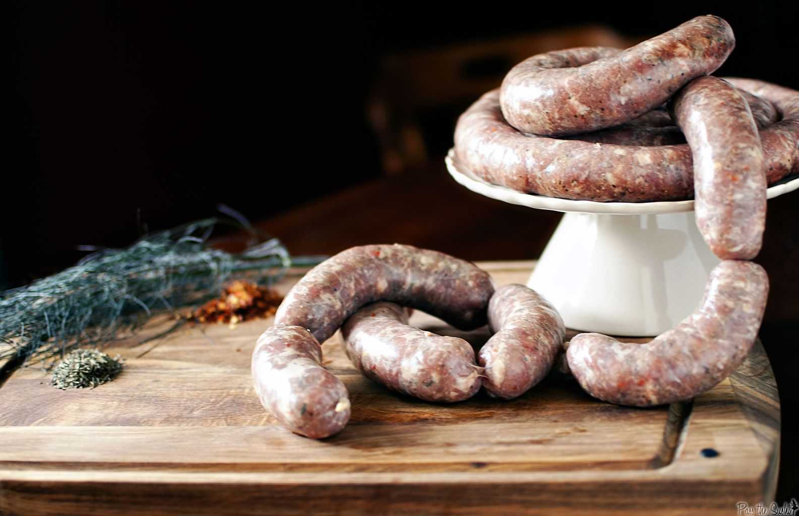 Learn how to make spicy Italian sausage from scratch! From grinding and flavoring the meat to filling and cooking the casings, this post will show you how!