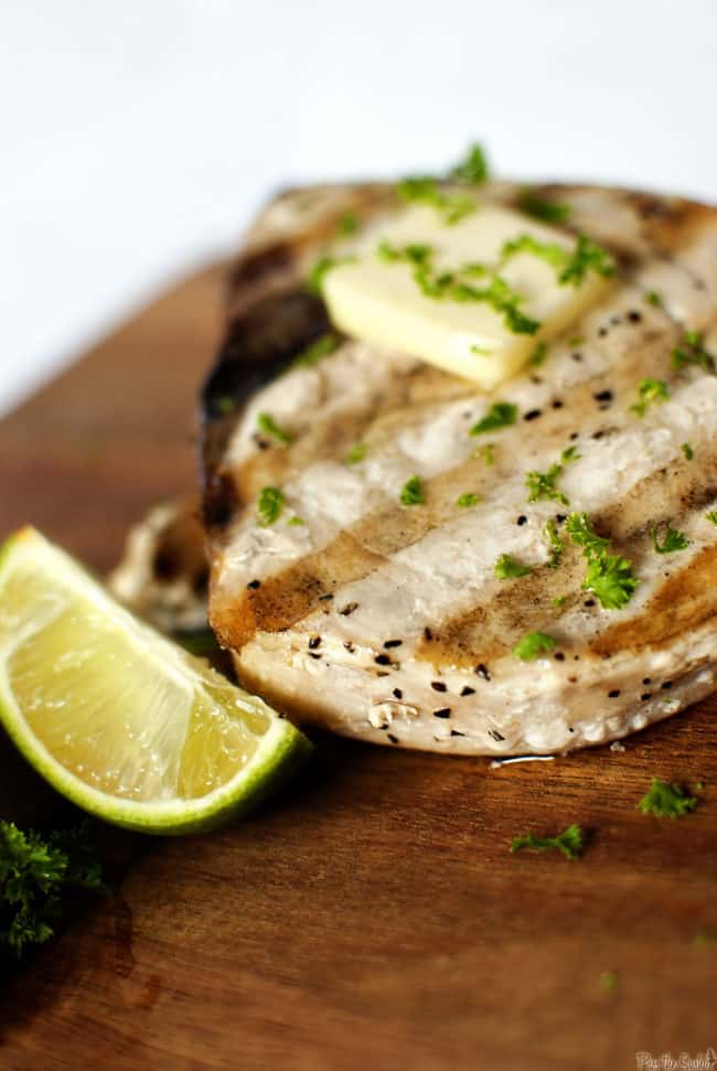 Grilled swordfish steaks are easy to make and delicious, too. They look fancy, but they are a no-fuss, flavorful, healthy dinner. // PassTheSushi.com