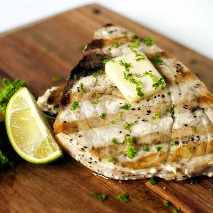 Grilled swordfish steaks are easy to make and delicious, too. They look fancy, but they are a no-fuss, flavorful, healthy dinner. // PassTheSushi.com