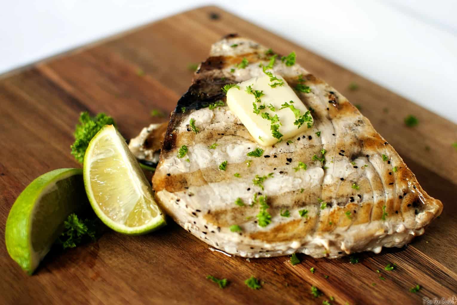 Grilled swordfish steaks are easy to make and delicious, too. They look fancy, but they are a no-fuss, flavorful, healthy dinner. // PassTheSushi.com