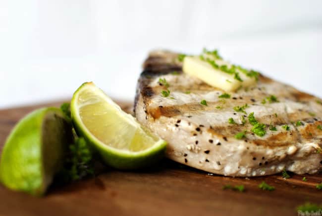 Grilled swordfish steaks are easy to make and delicious, too. They look fancy, but they are a no-fuss, flavorful, healthy dinner. // PassTheSushi.com