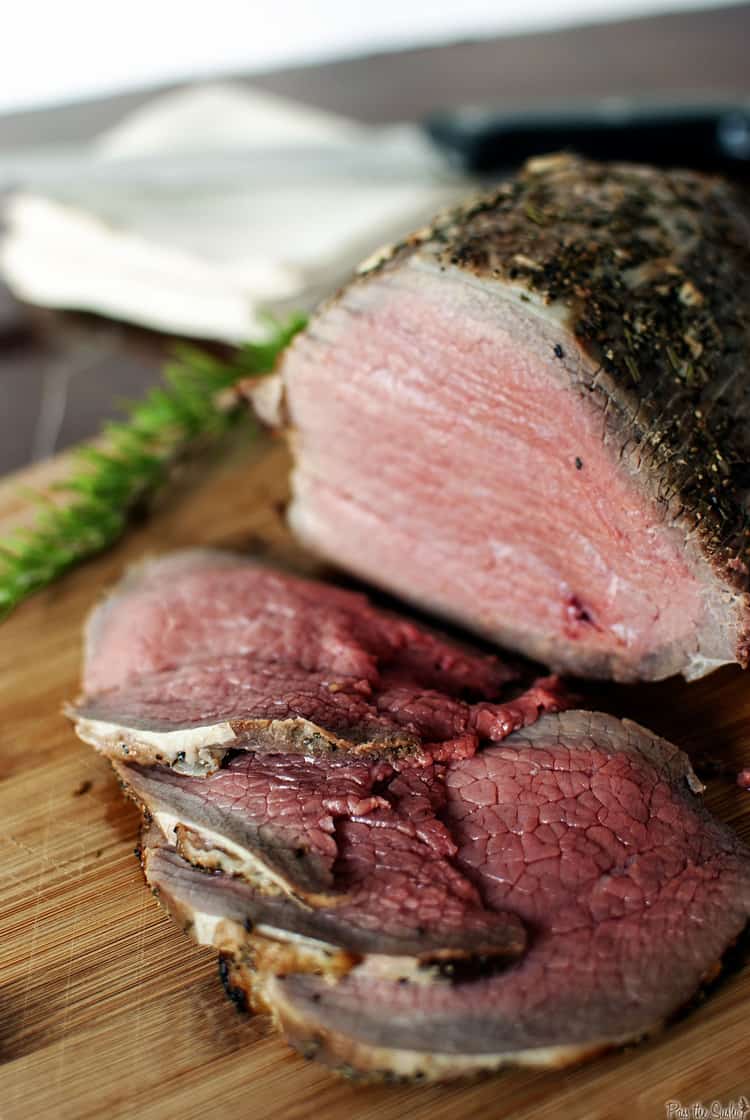 grill-roasted beef on a wooden cutting board