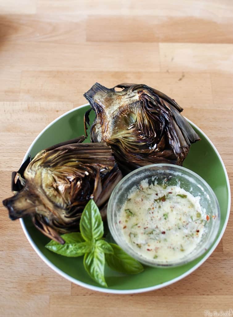 Grilled artichokes have an amazing flavor that you must taste to believe! Grilling artichokes is so easy to do, there's no reason not to try this recipe! \\ passthesushi.com