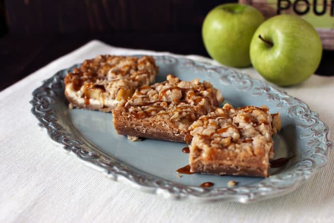 Caramel apple cheesecake cookie bars are the perfect welcome to fall baking!  Recipe on PassTheSushi.com
