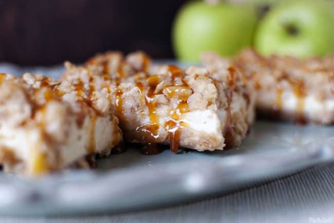 Caramel apple cheesecake cookie bars are the perfect welcome to fall baking!  Recipe on PassTheSushi.com