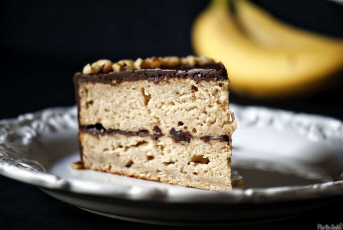Banana Cake with Chocolate Glaze is a classic banana layer cake accented with cinnamon. The cake is covered in a thick chocolate glaze. \\ PassTheSushi.com