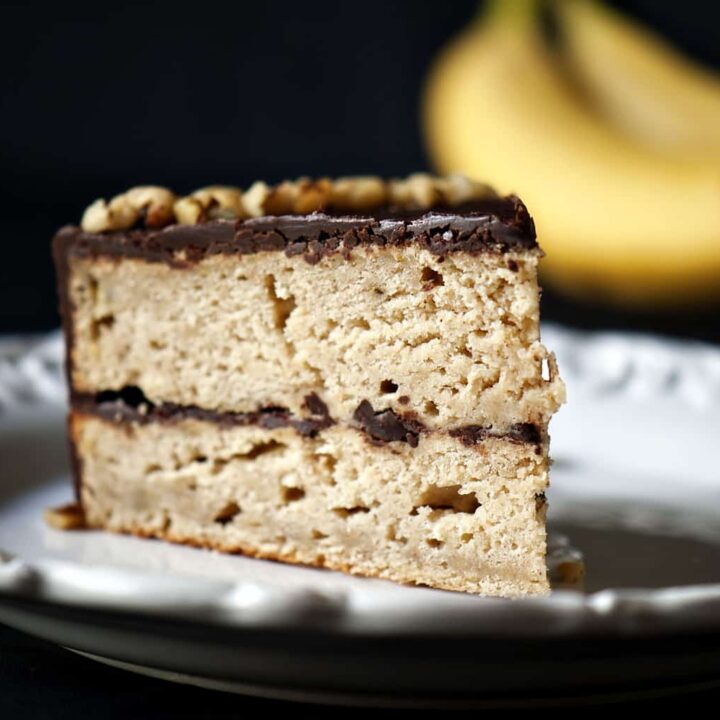 Banana Cake with Chocolate Glaze is a classic banana layer cake accented with cinnamon. The cake is covered in a thick chocolate glaze. \\ PassTheSushi.com