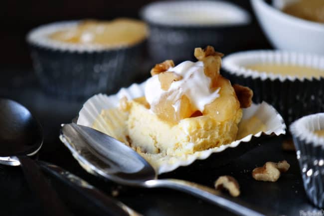 Individual serving cheesecakes topped with fruity sweet apple pie filling. This easy, semi-homemade dessert recipe is sure to make your taste buds happy. \\ PassTheSushi.com