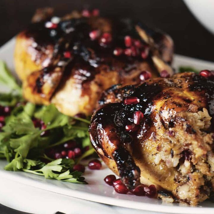 Christmas Dinner at its finest includes making Glazed Cornish Hens with Pomegranate-Rice Stuffing. | PassTheSushi.com