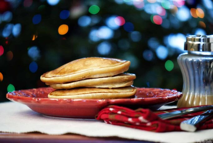 Eggnog pancakes can be enjoyed as part of your Christmas breakfast, or really, any time at all. Even after the holidays are over! | PassTheSushi.com