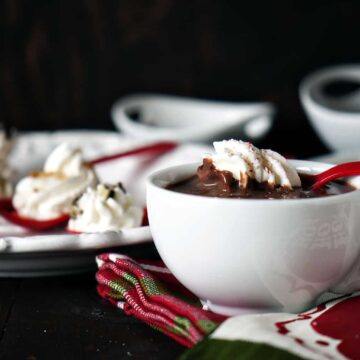 Adult hot chocolate ﻿is rich, creamy, and thick, boozed up with alcohol and topped with fresh whipped cream dollops. For grown up kids! \\ PassTheSushi.com