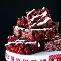 Red velvet cake mixes levels up classic rice krispies in this pile of treats on a platter.