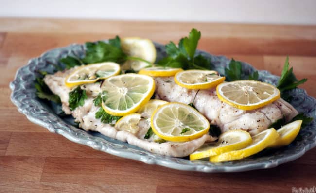 Baked fish is a healthy choice for lunch or dinner. Lemon and fresh parsley give this baked fish dinner a huge burst of flavor. \ PassTheSushi.com