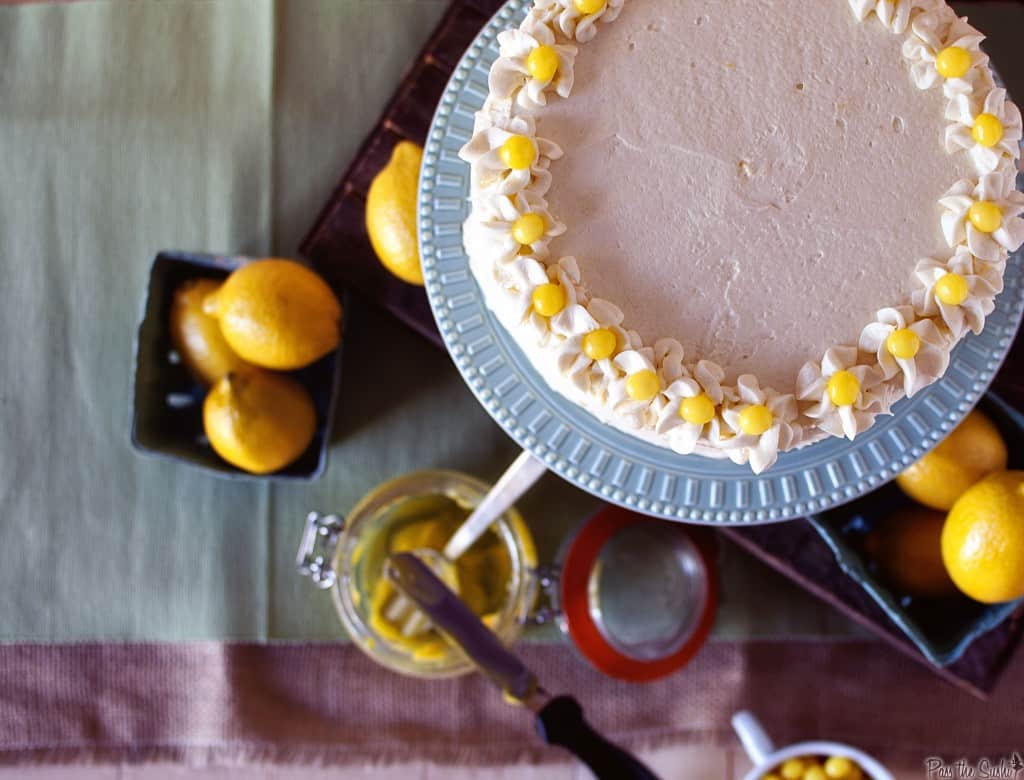 Lemon Drop Cake from above with lemons in a square dish | Kita Roberts PassTheSushi.com