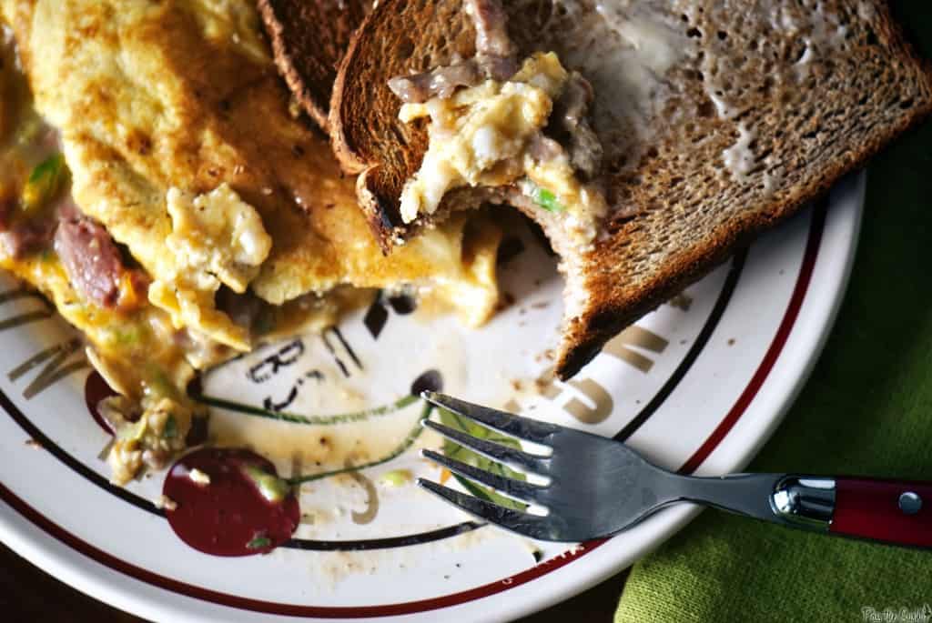 Closeup of prime rib omelet with toast | Kita Roberts PassTheSushi.com