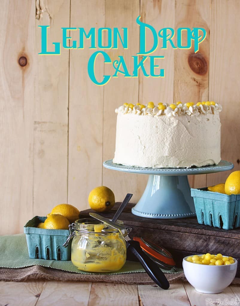 Lemon Drop Cake on a stand with jar of lemon curd | PassTheSushi.com