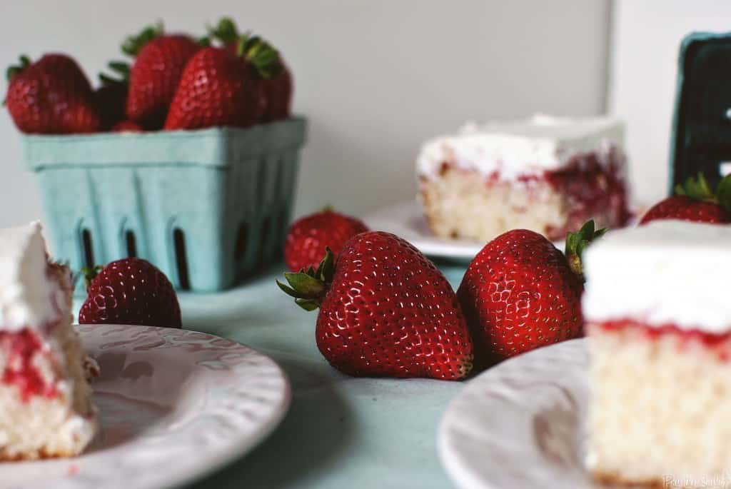 Strawberry Poke Cake | Closeup of strawberries | Kita Roberts PassTheSushi.com