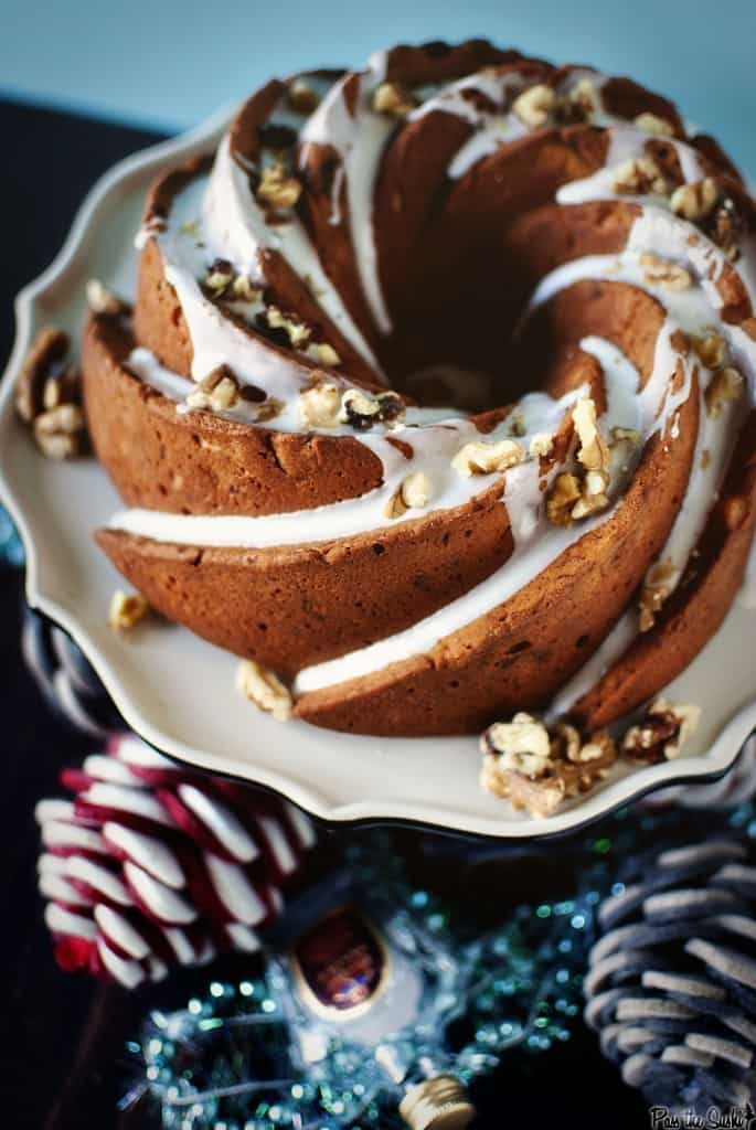 Banana Cake from Above with pinecones scattered around it | Kita Roberts PassTheSushi.com