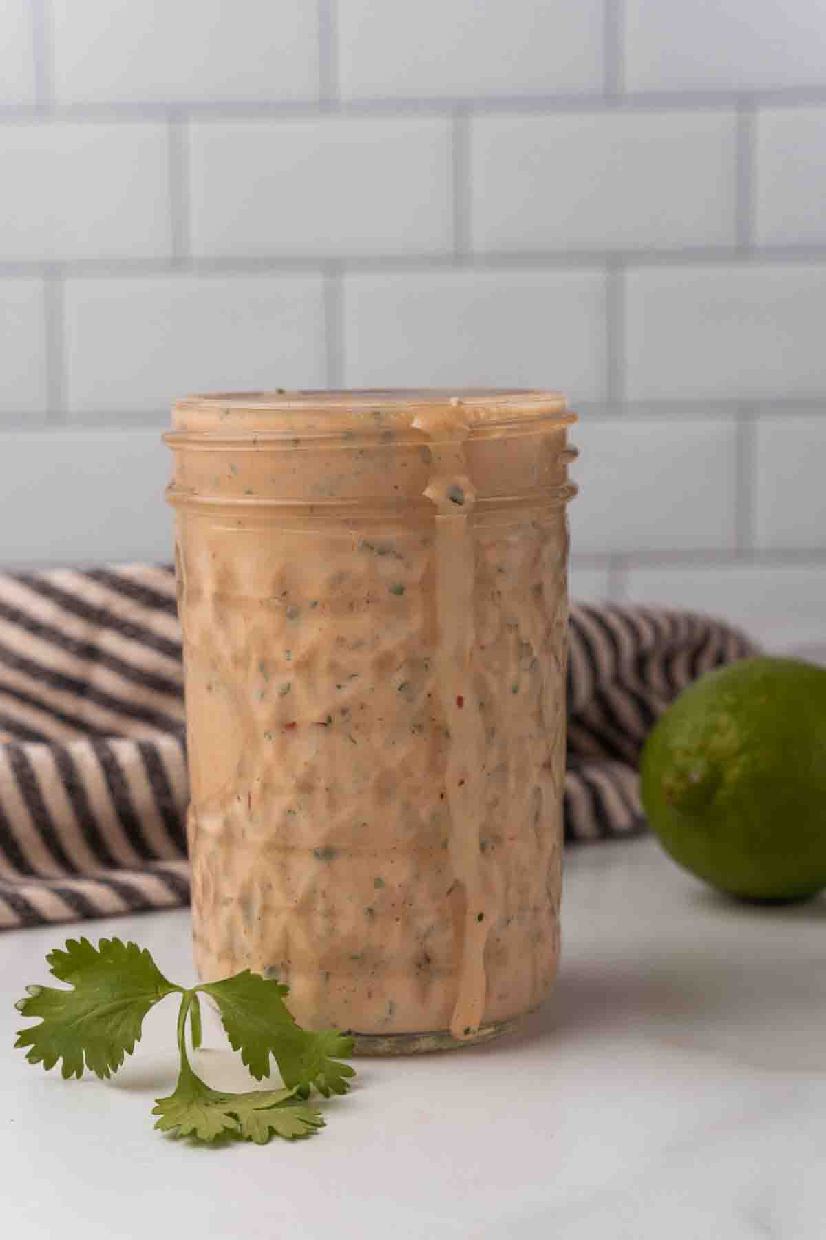 Side show of a jar of southwest dressing. 