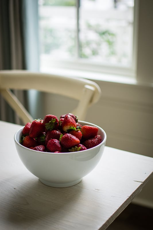 strawberries on counter | Kitarobertsphotography