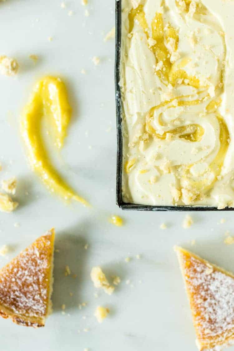 Limoncello Gelato with Vanilla Lemon Curd Swirl with two pieces of danish next to it | Kita Roberts PassTheSushi.com